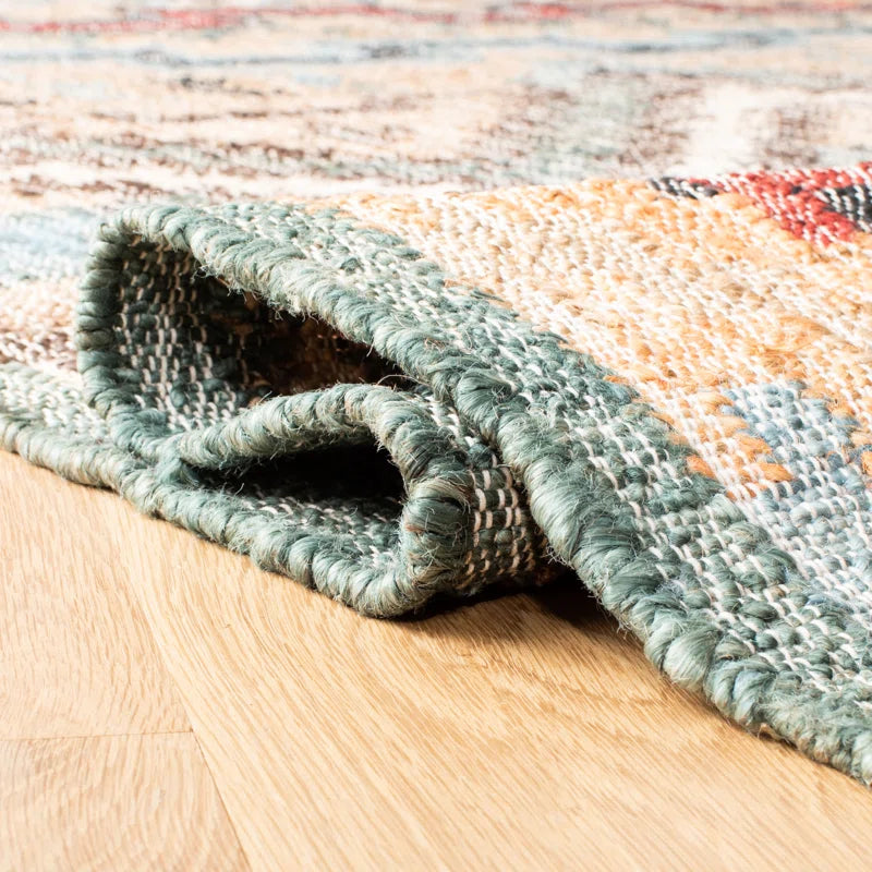 Glynda Southwestern Handmade Flatweave Jute Tan Area Rug