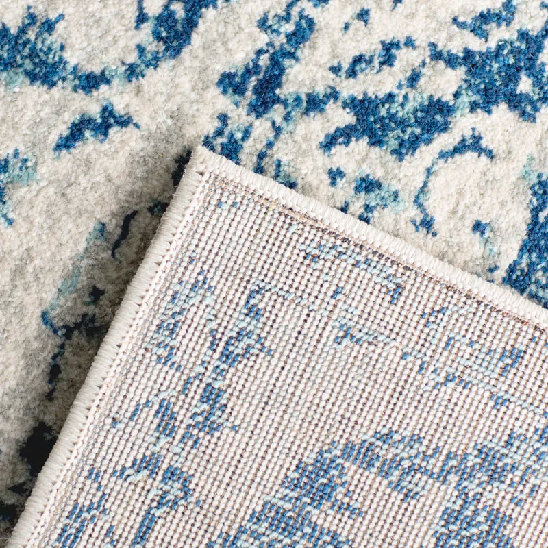 Annette Oriental Area Rug in Blue/Ivory