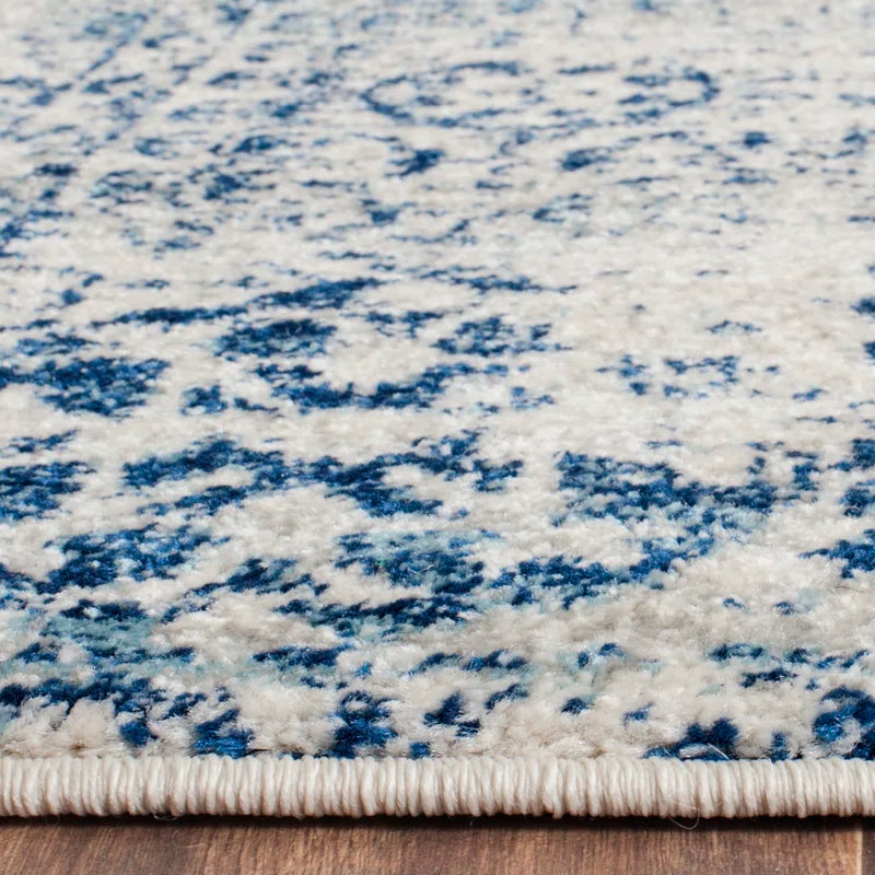 Annette Oriental Area Rug in Blue/Ivory